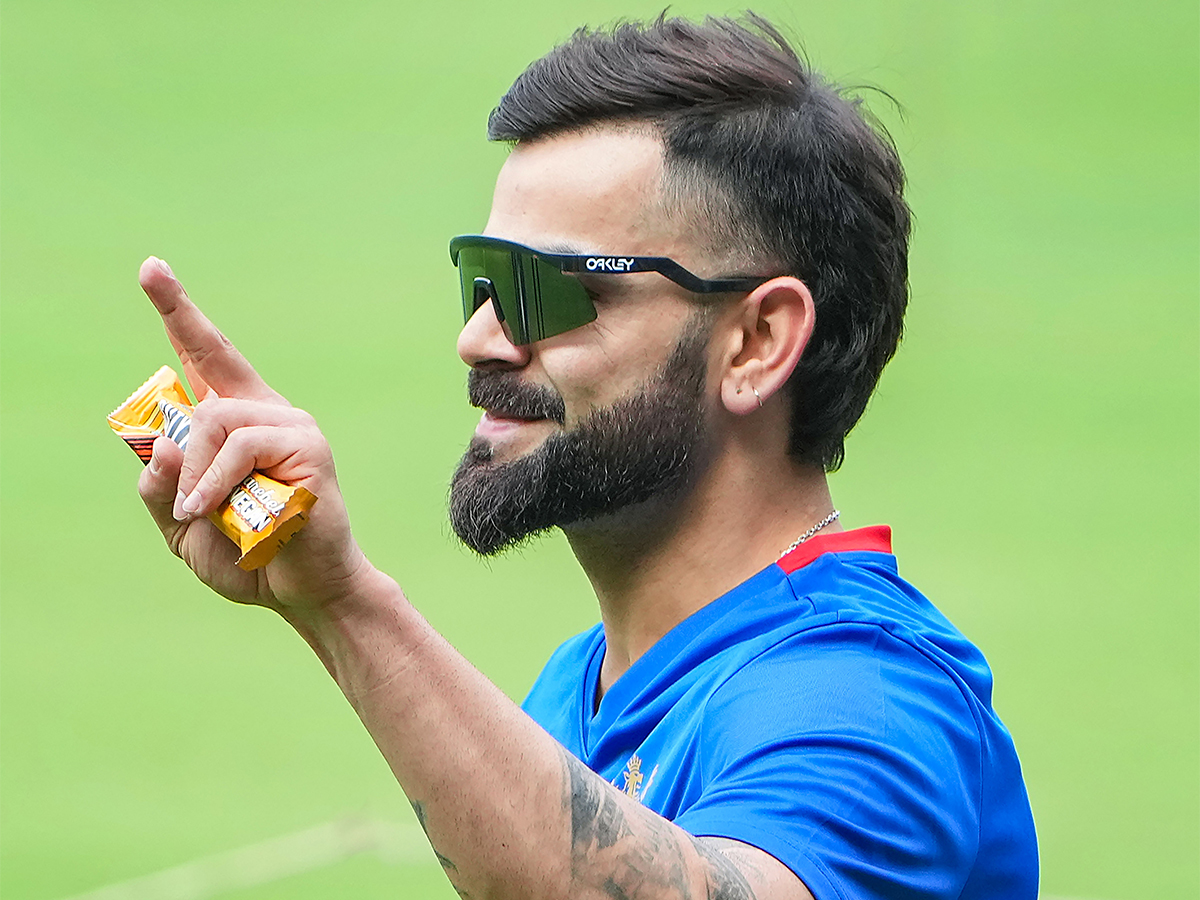 Virat Kohli during a training session ahead of the Indian Premier League - Sakshi17