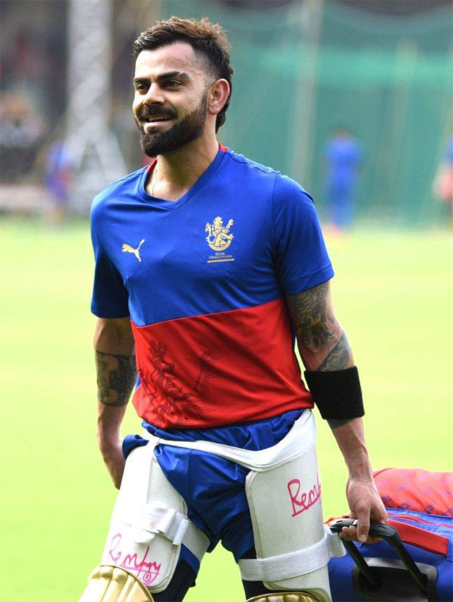 Virat Kohli during a training session ahead of the Indian Premier League - Sakshi18