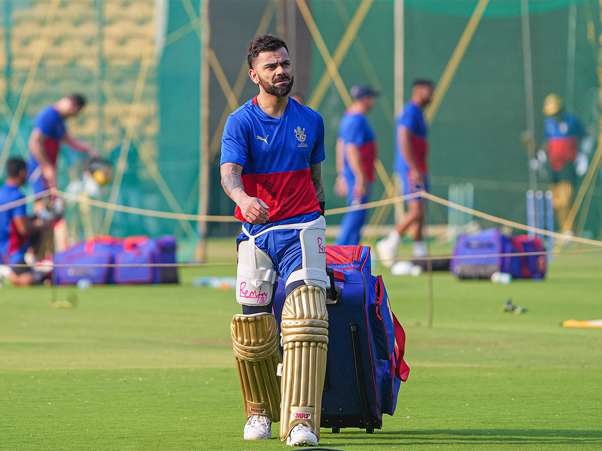 Virat Kohli during a training session ahead of the Indian Premier League - Sakshi2