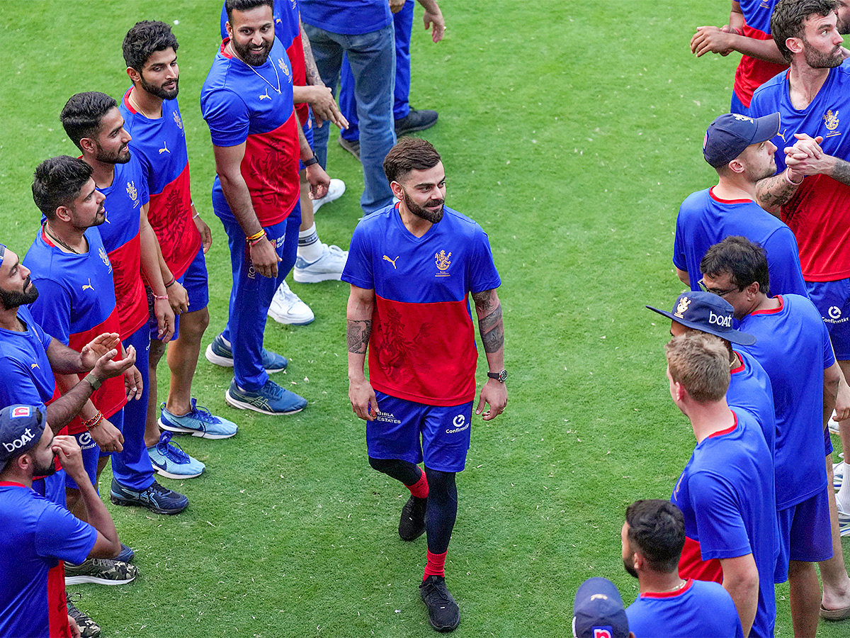 Virat Kohli during a training session ahead of the Indian Premier League - Sakshi3