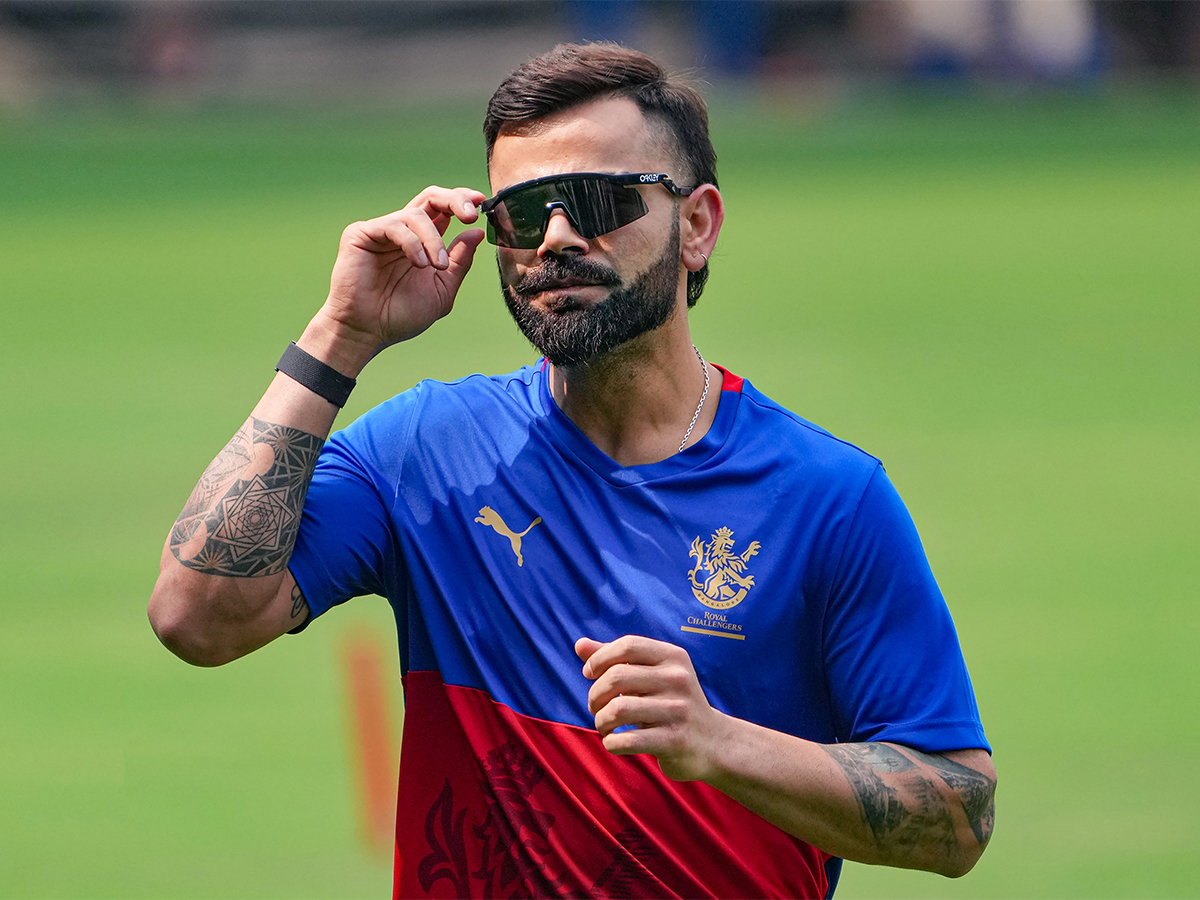 Virat Kohli during a training session ahead of the Indian Premier League - Sakshi5