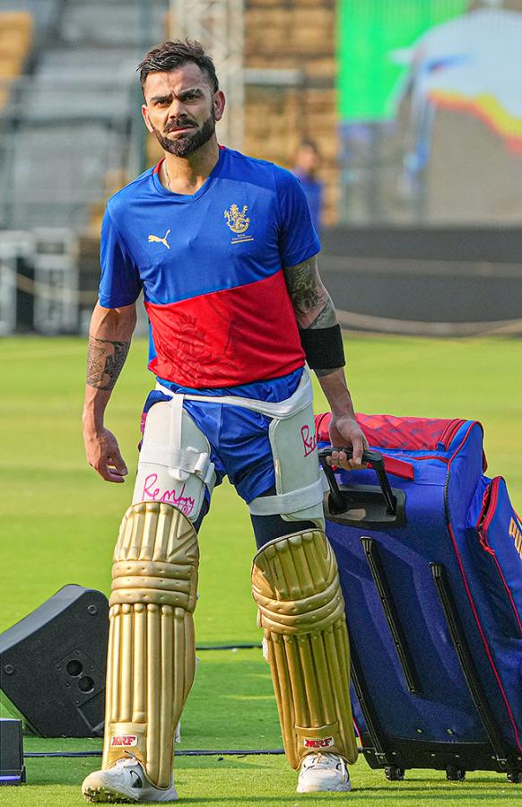 Virat Kohli during a training session ahead of the Indian Premier League - Sakshi7