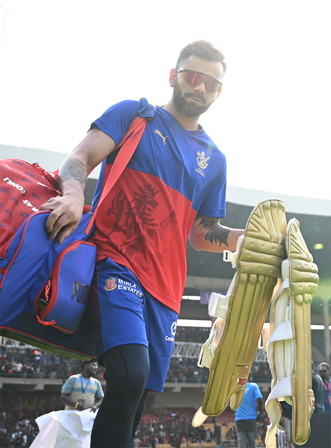 Virat Kohli during a training session ahead of the Indian Premier League - Sakshi9