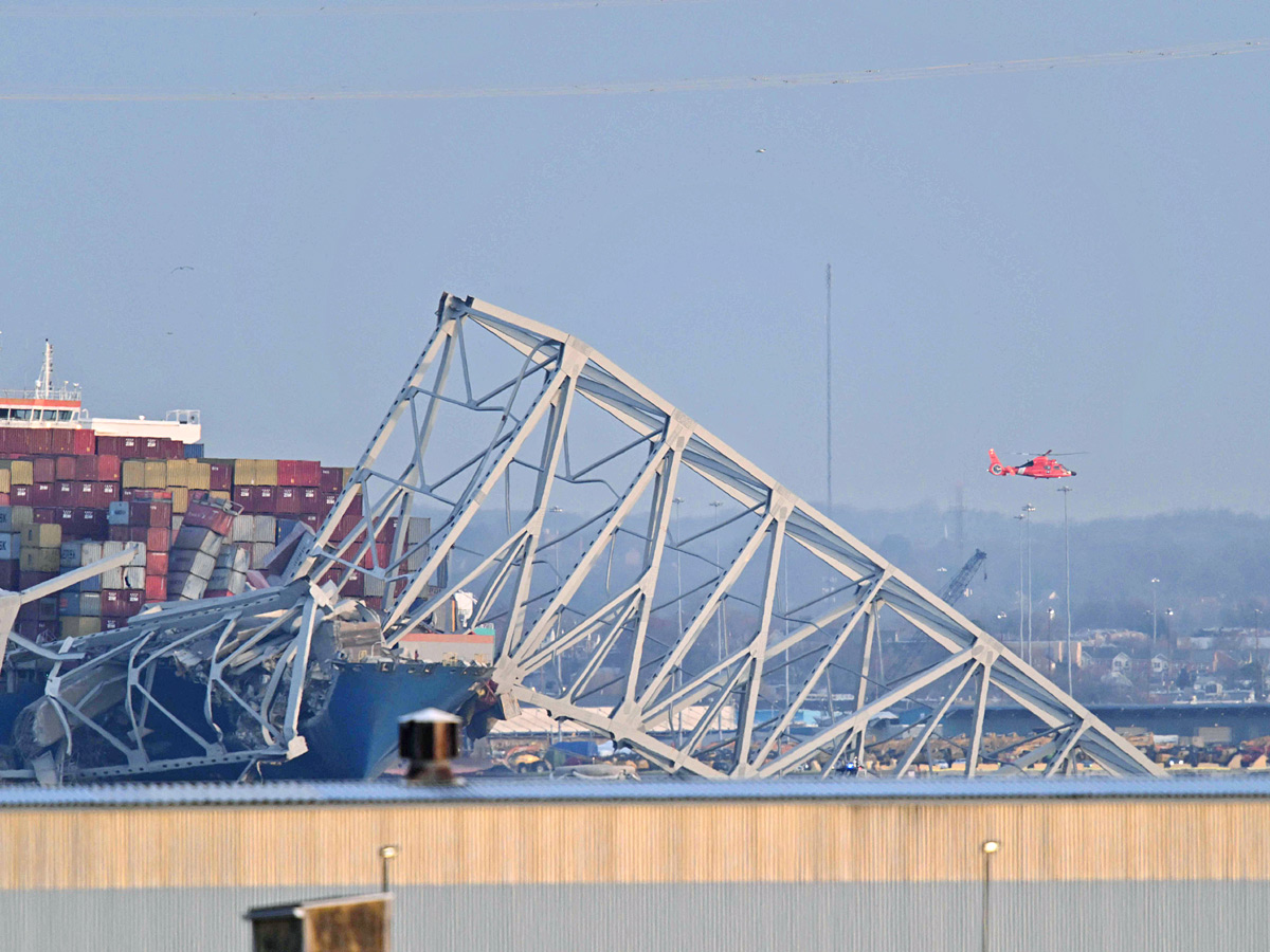 Maryland bridge collapses after being hit by cargo ship Photos - Sakshi4