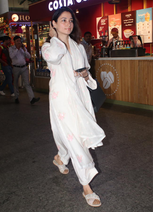 Tamannaah Bhatia Spotted At Mumbai Airport Arrival Photos - Sakshi6