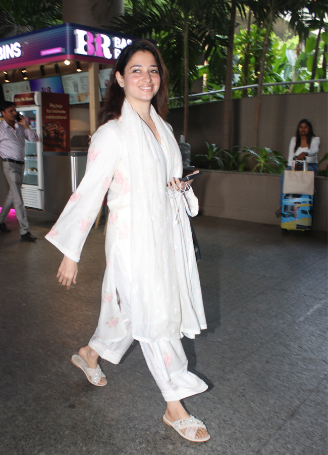 Tamannaah Bhatia Spotted At Mumbai Airport Arrival Photos - Sakshi8