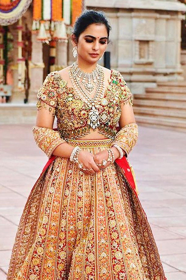  Isha Ambani Wore Diamond And Gold Embellished Blouse At Anant Ambanis Pre Wedding Celebrations - Sakshi9