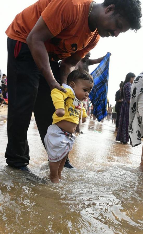 Maha Shivaratri 2021 Devotees Rush Beach Photos - Sakshi17