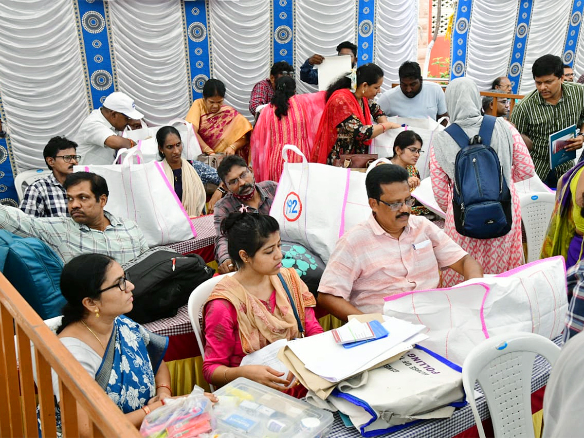 Officials Busy Moving Polling Materials From Andhra University (Photos)14