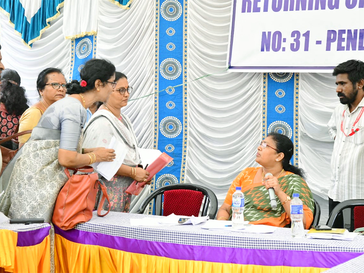 Officials Busy Moving Polling Materials From Andhra University (Photos)15