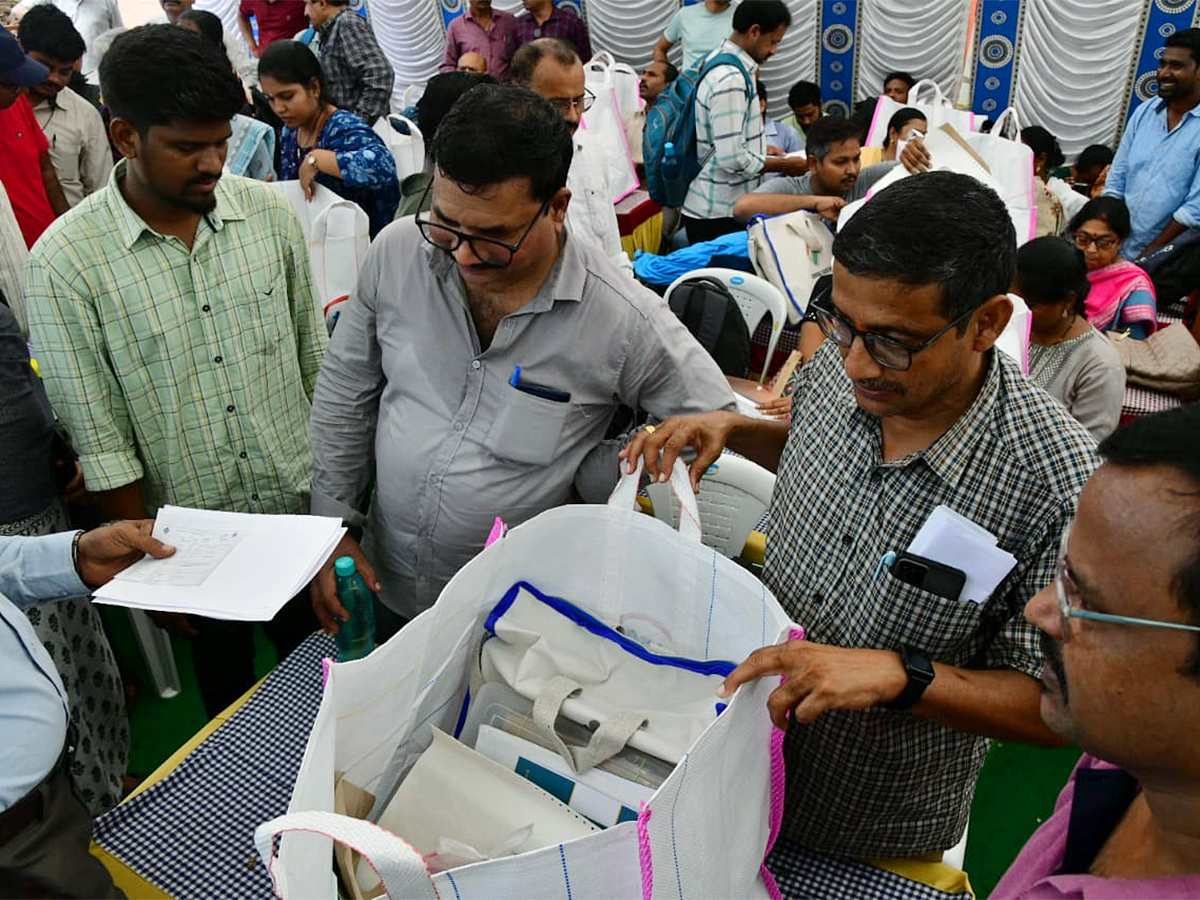 Officials Busy Moving Polling Materials From Andhra University (Photos)17