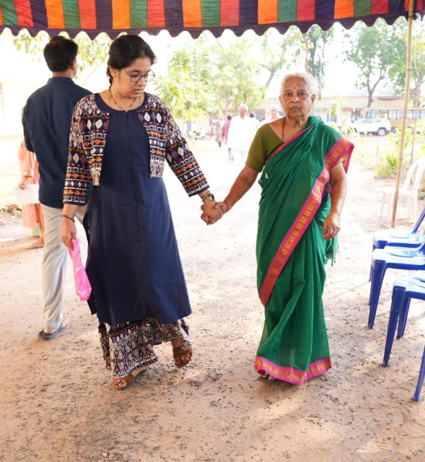 Telangana Elections 2024: Voters At Polling Stations Photos21