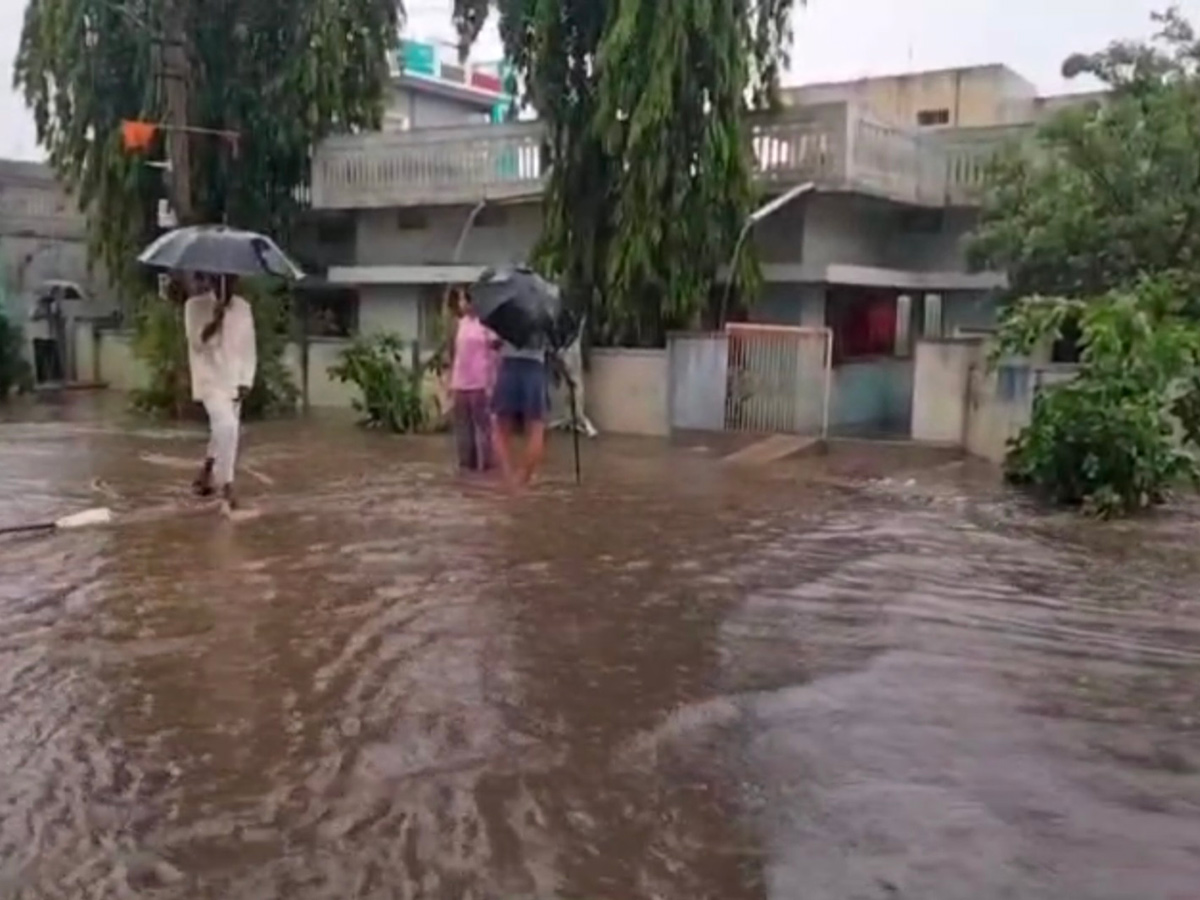 Rain and Gusty Winds In Telangana: Photos18