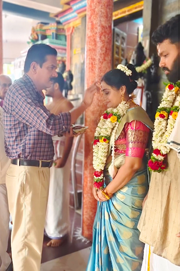 Meera Vasudevan married cinematographer Vipin Puthiyankam Photos13