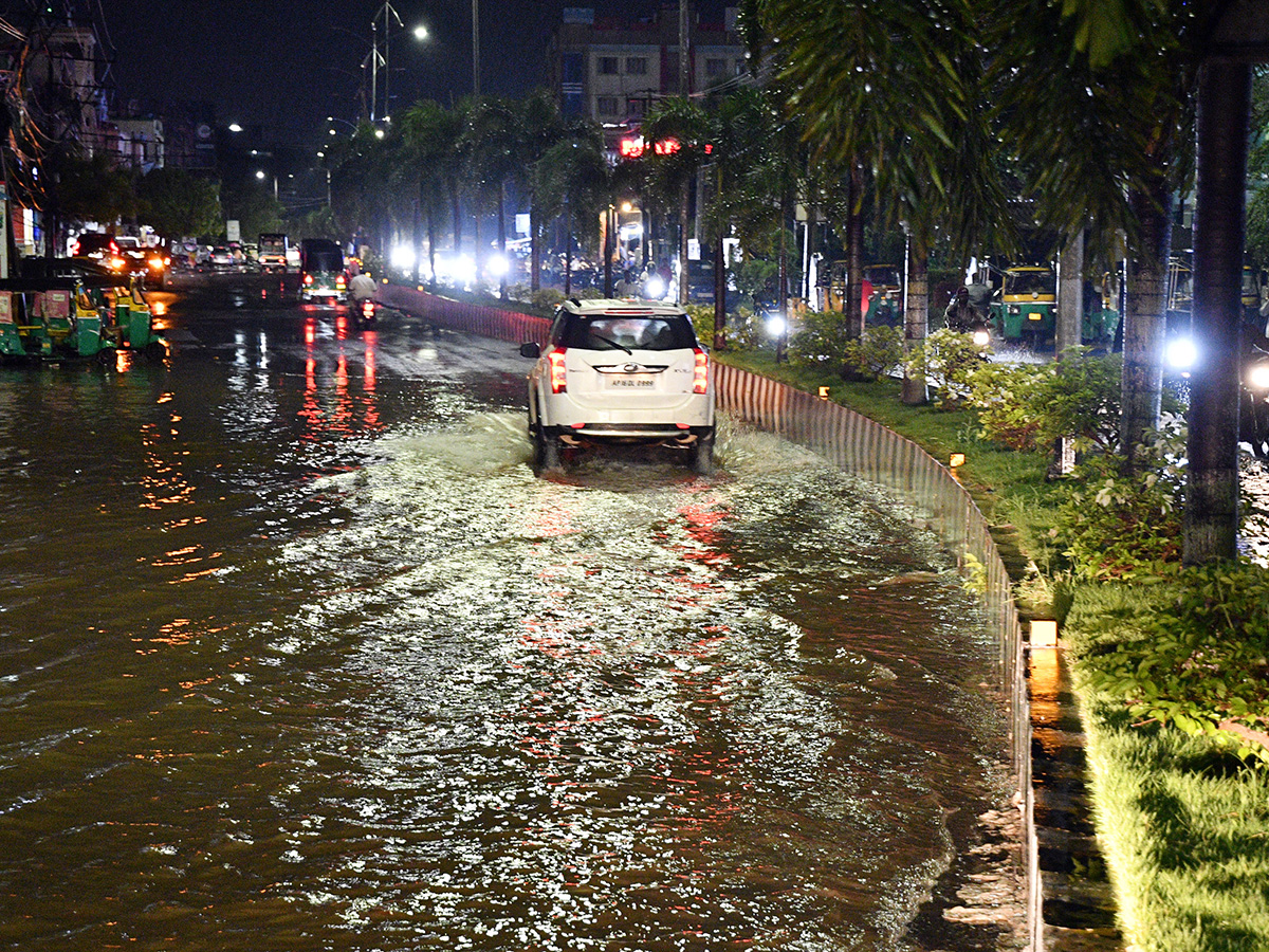 heavy rain in vijayawada photos 16