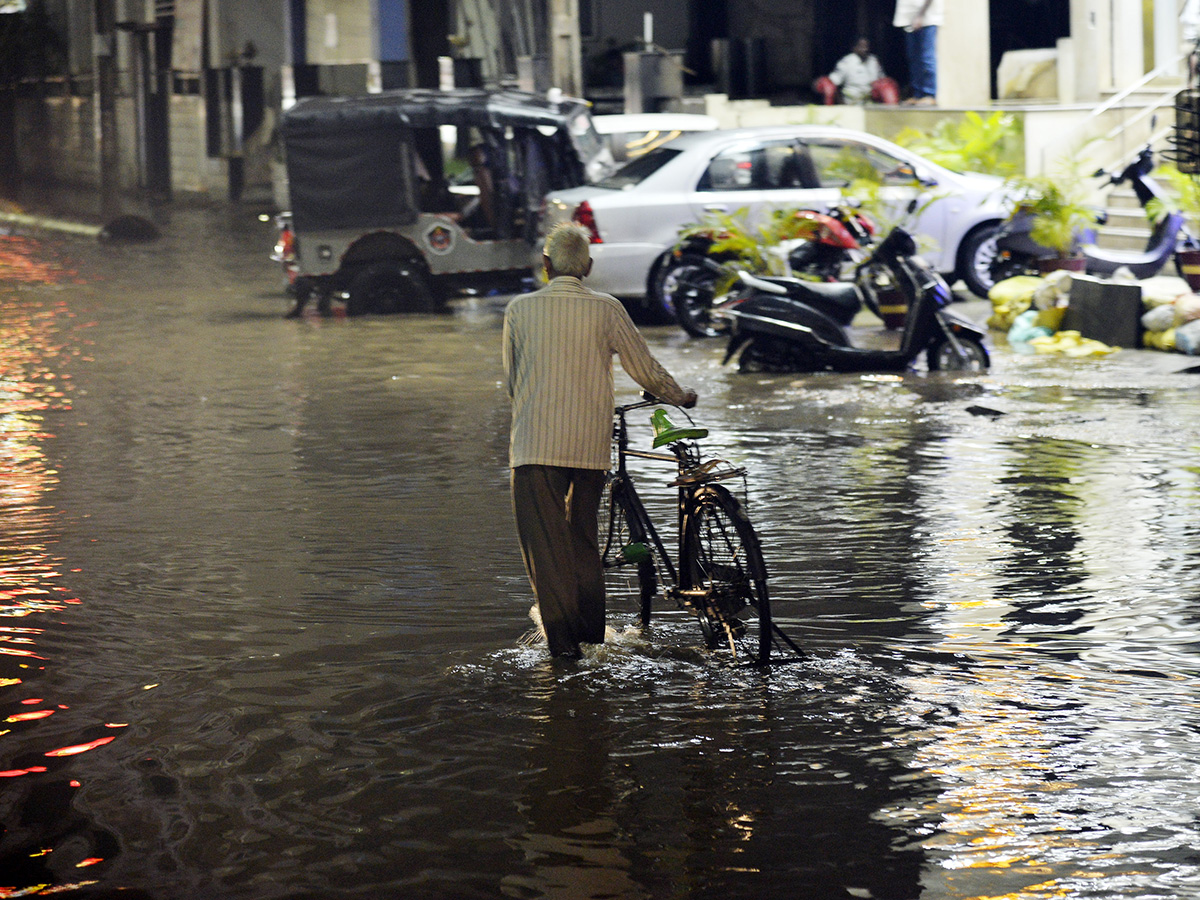 heavy rain in vijayawada photos 17