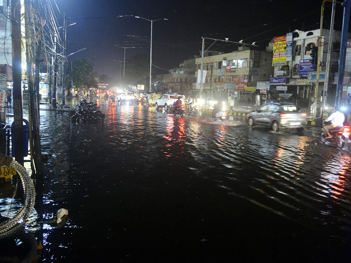 heavy rain in vijayawada photos 23