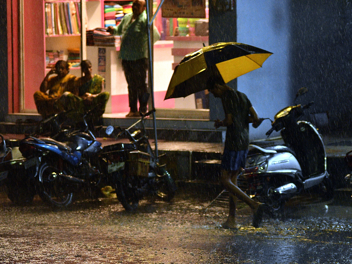 heavy rain in vijayawada photos 32