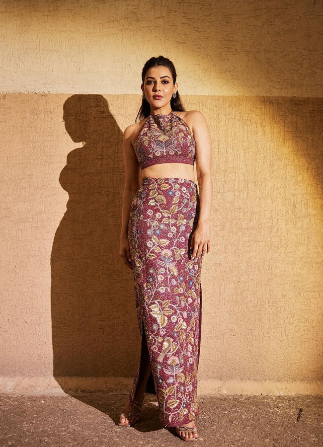 Tollywood Dynamic Actress Kajal Aggarwal Stunning Photos In Maroon Floral Print Dress3