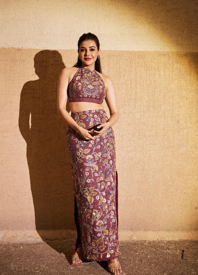 Tollywood Dynamic Actress Kajal Aggarwal Stunning Photos In Maroon Floral Print Dress4