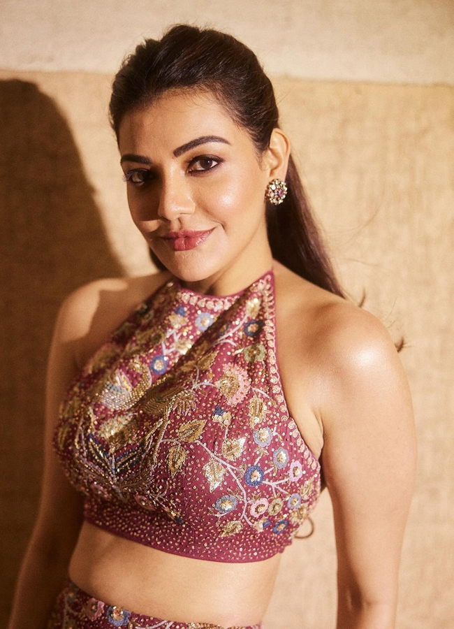 Tollywood Dynamic Actress Kajal Aggarwal Stunning Photos In Maroon Floral Print Dress7