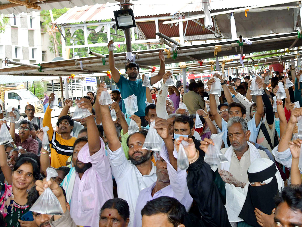 Fish Prasadam Distribution At Exhibition Ground In Nampally: Photos24