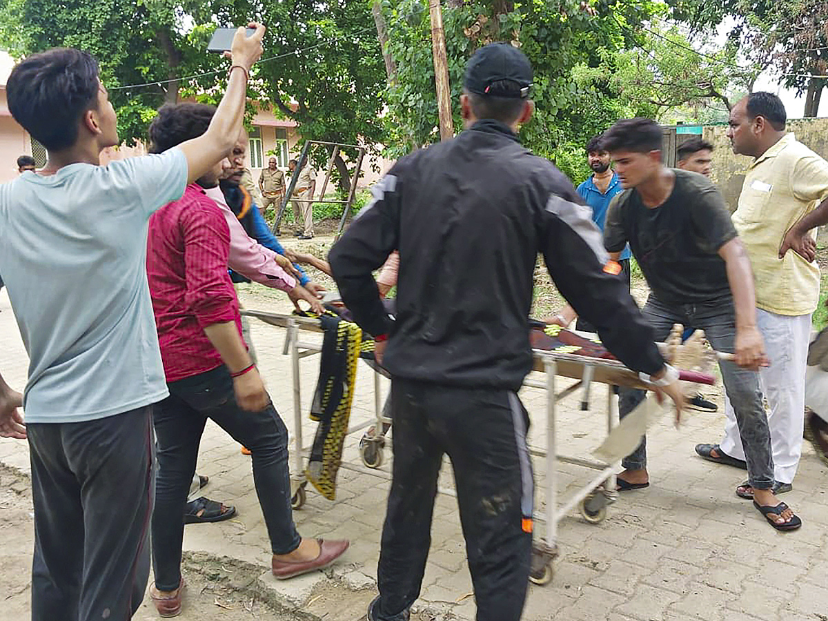 Dozens killed in stampede at India religious event Photos6