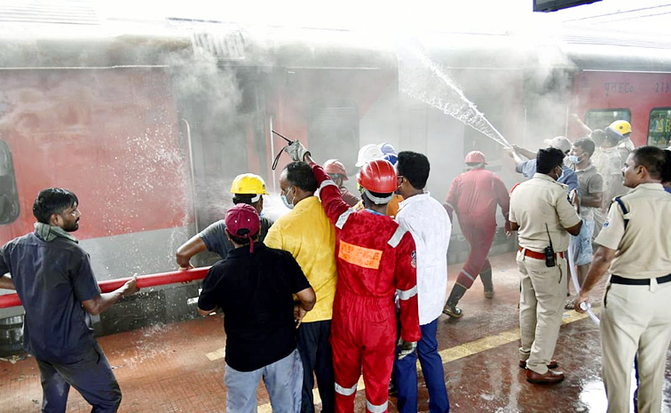 Fire Accident In Korba Visakha Express At Vizag Railway Station Photos6