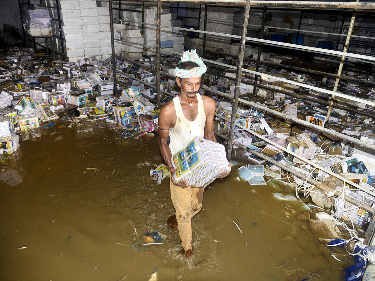 Check out the photo gallery of the flood-affected victims in Vijayawada.30