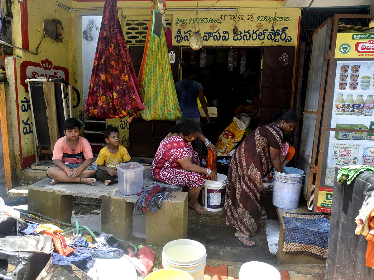 Check out the photo gallery of the flood-affected victims in Vijayawada.32