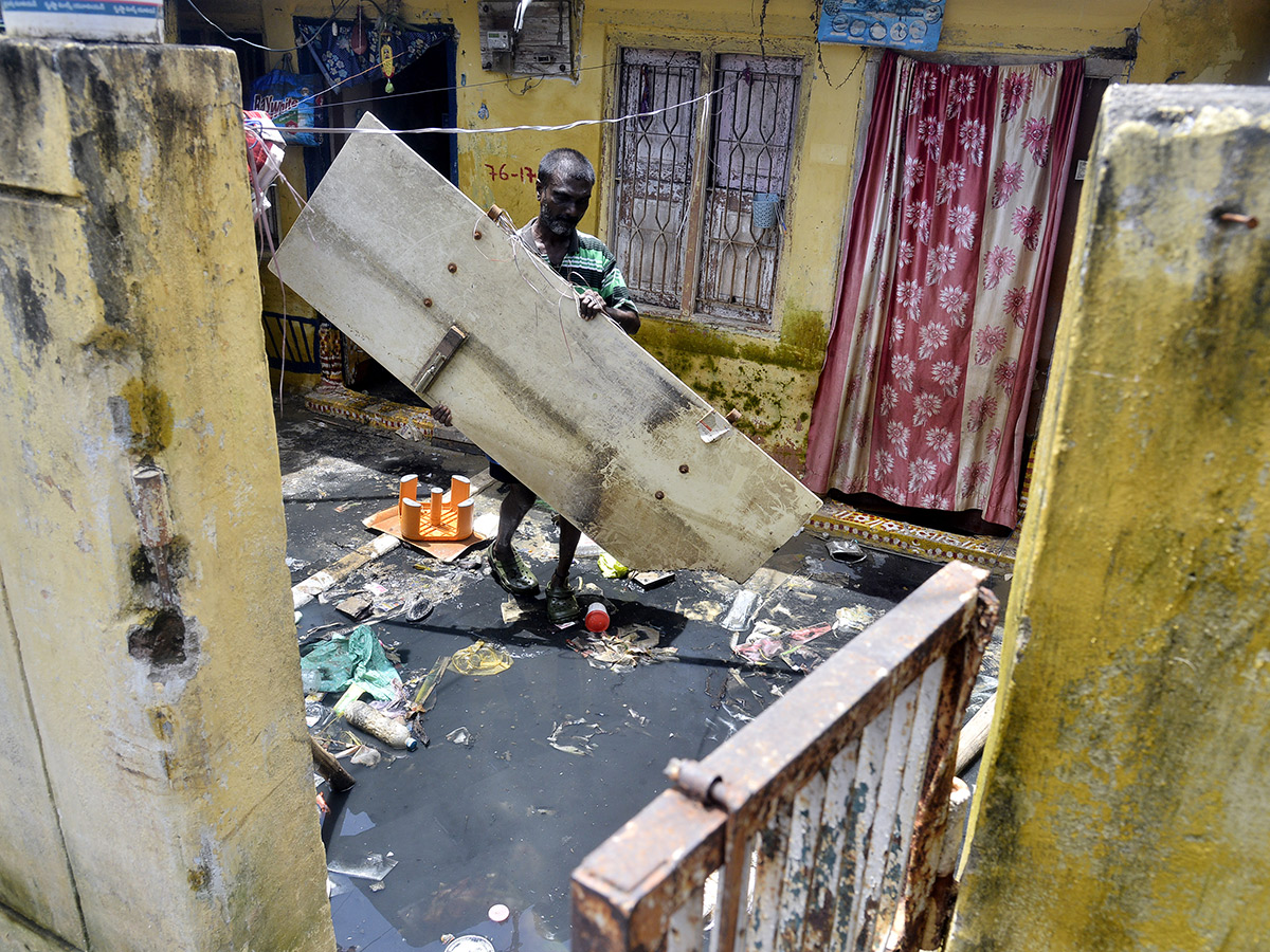 Check out the photo gallery of the flood-affected victims in Vijayawada.34