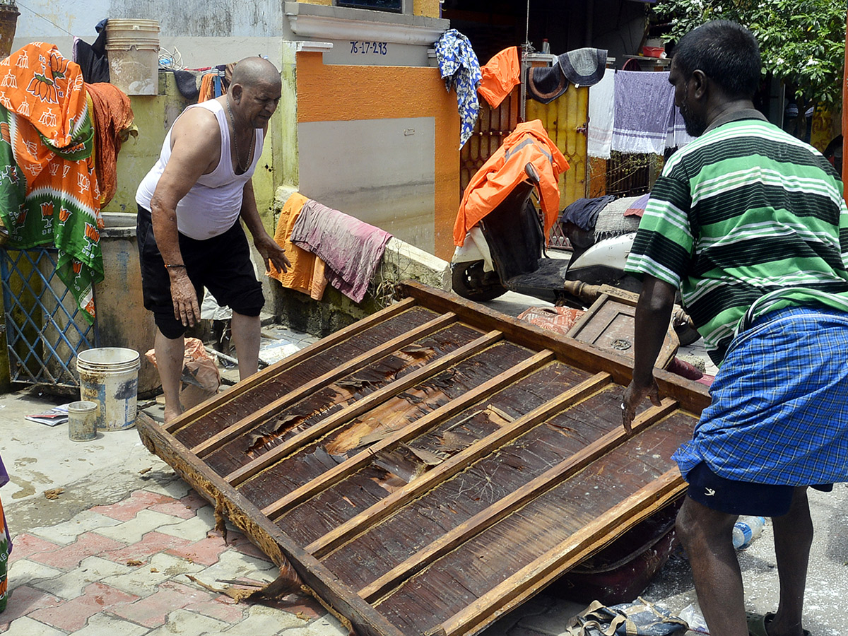 Check out the photo gallery of the flood-affected victims in Vijayawada.35