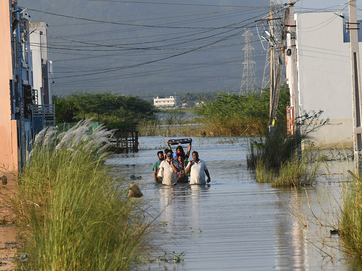 Check out the photo gallery of the flood-affected victims in Vijayawada.55