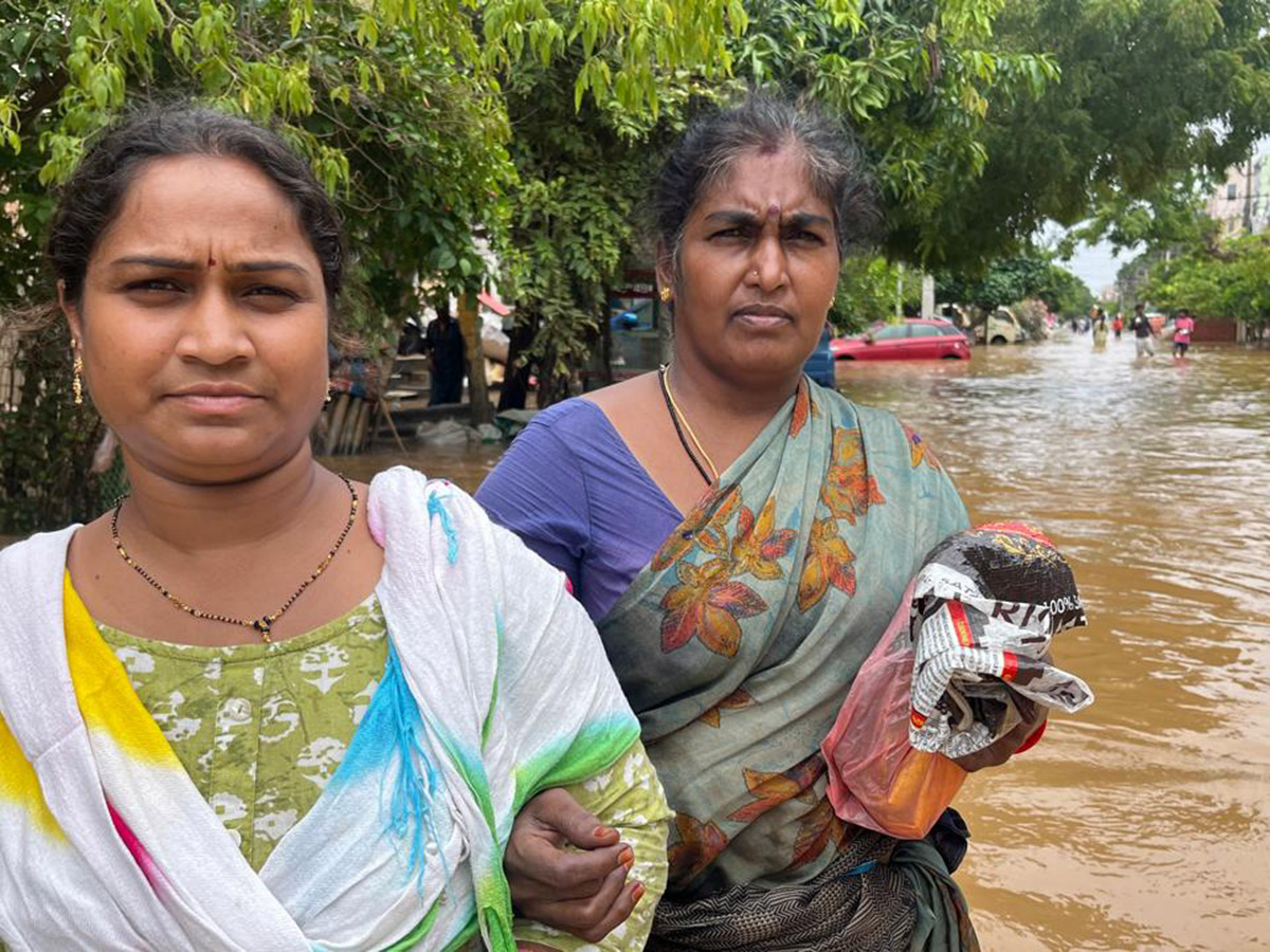 Check out the photo gallery of the flood-affected victims in Vijayawada.56