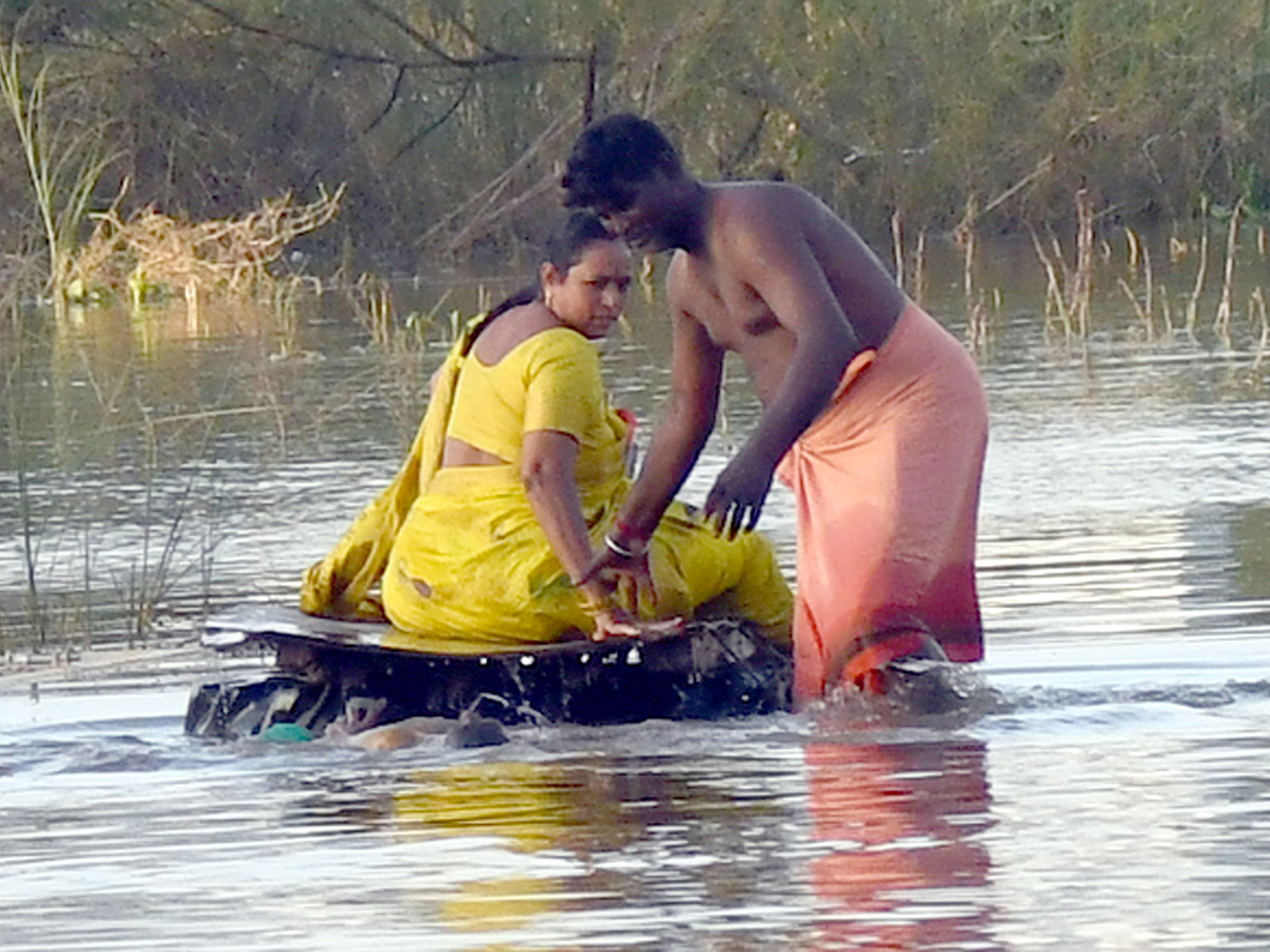 Check out the photo gallery of the flood-affected victims in Vijayawada.13