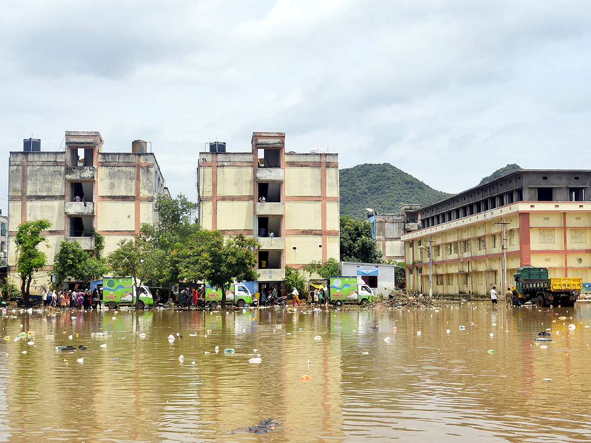 Check out the photo gallery of the flood-affected victims in Vijayawada.14