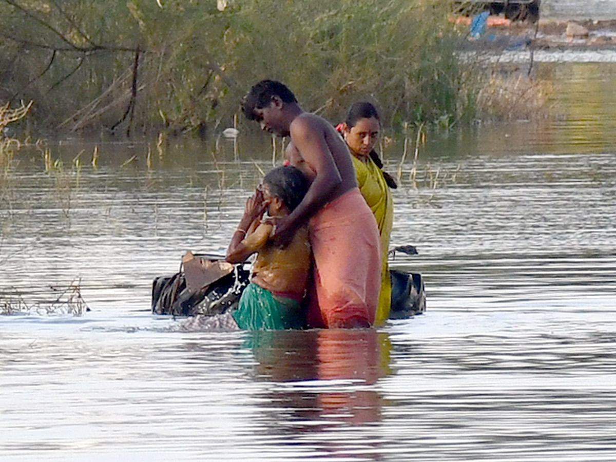 Check out the photo gallery of the flood-affected victims in Vijayawada.2