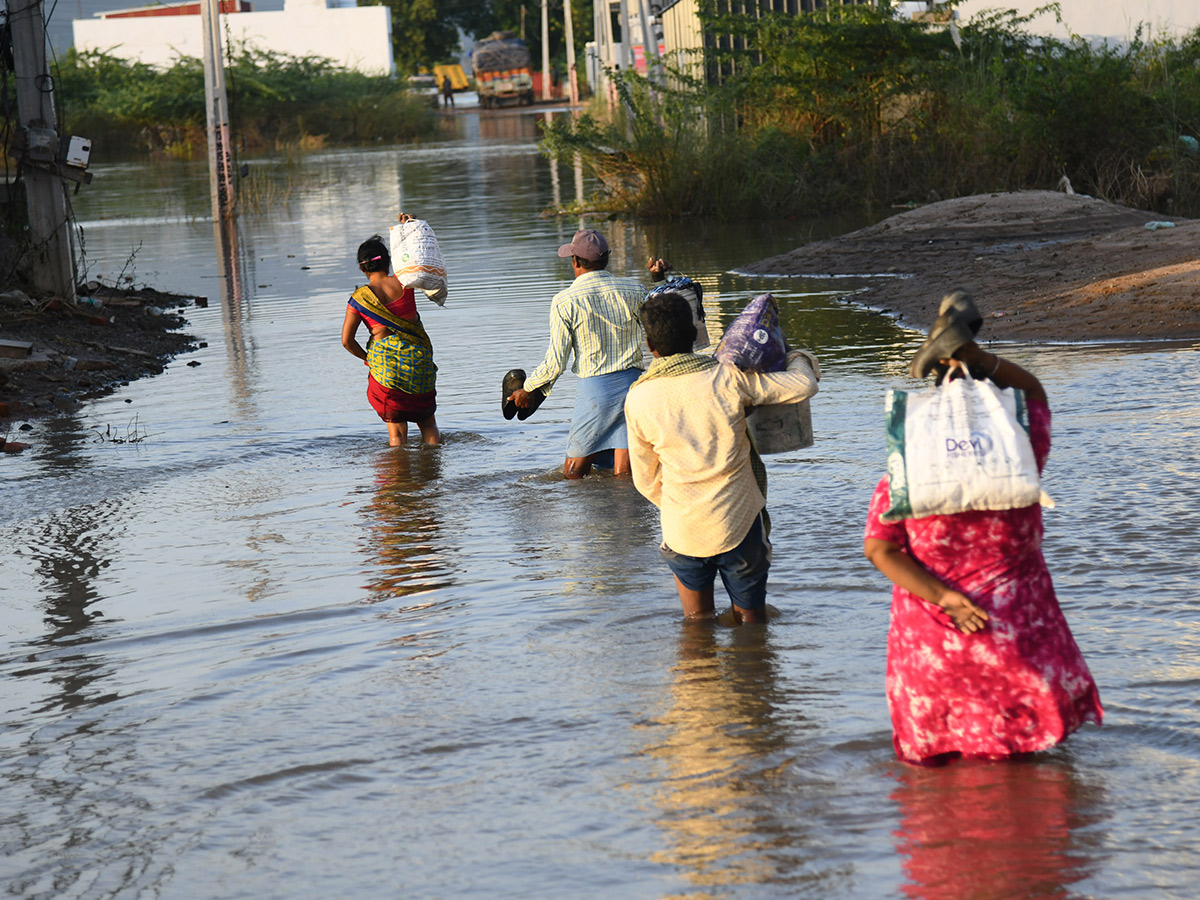 Check out the photo gallery of the flood-affected victims in Vijayawada.5