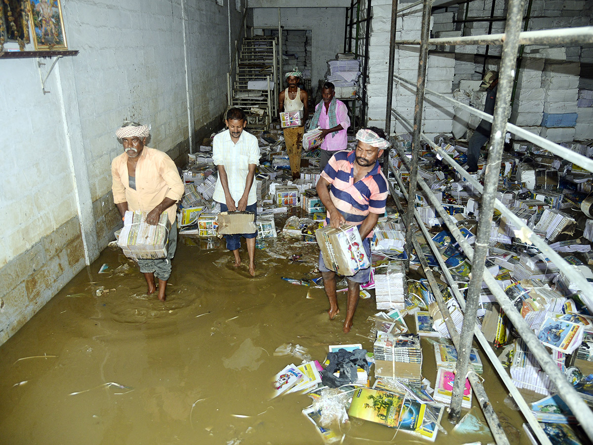 Check out the photo gallery of the flood-affected victims in Vijayawada.7