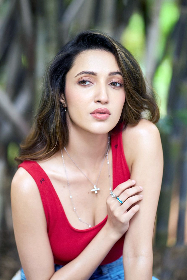 Neha Shetty poses in red top6