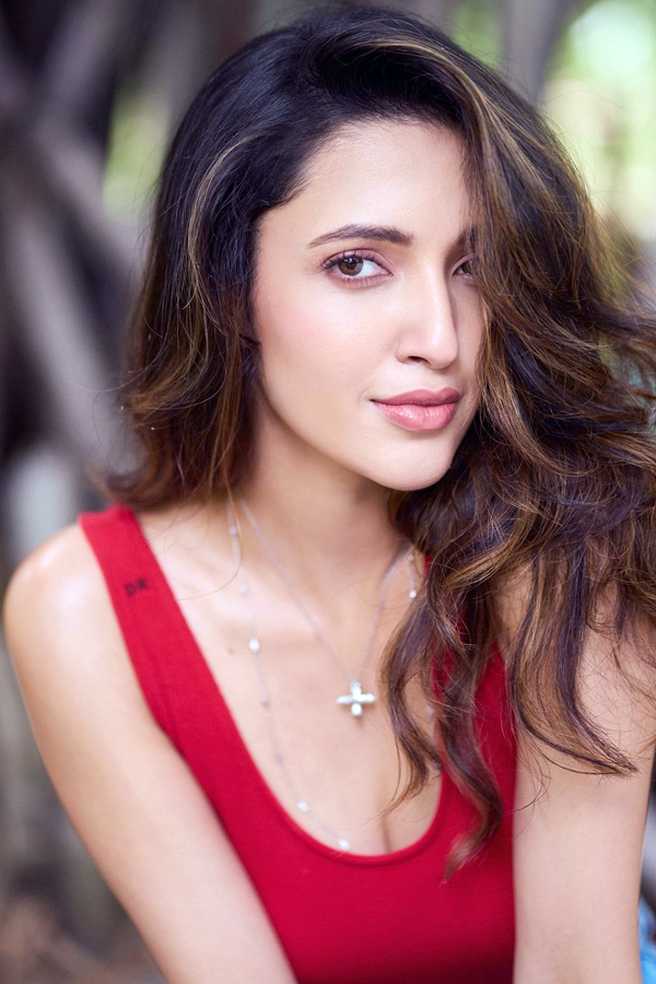 Neha Shetty poses in red top7