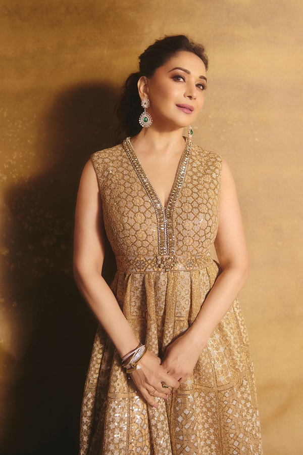 Actress Madhuri Dixit Dazzling Photos In Golden Color Dress2