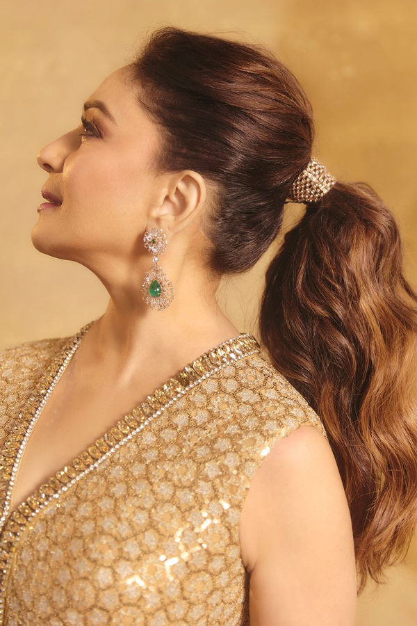 Actress Madhuri Dixit Dazzling Photos In Golden Color Dress8