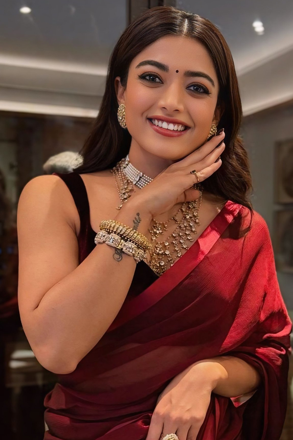 Pushpa Beauty Rashmika Mandanna Stunning Pose In Burgundy Saree14