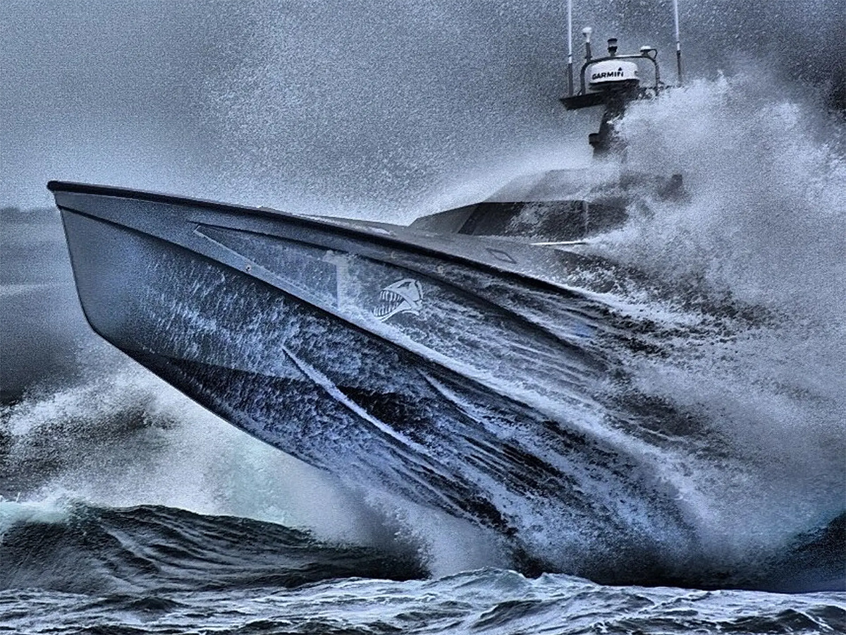 Twin hull hydrofoiling catamaran smashes big wave storm10