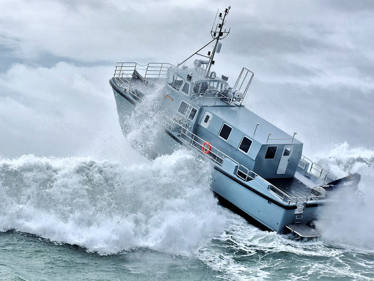 Twin hull hydrofoiling catamaran smashes big wave storm11