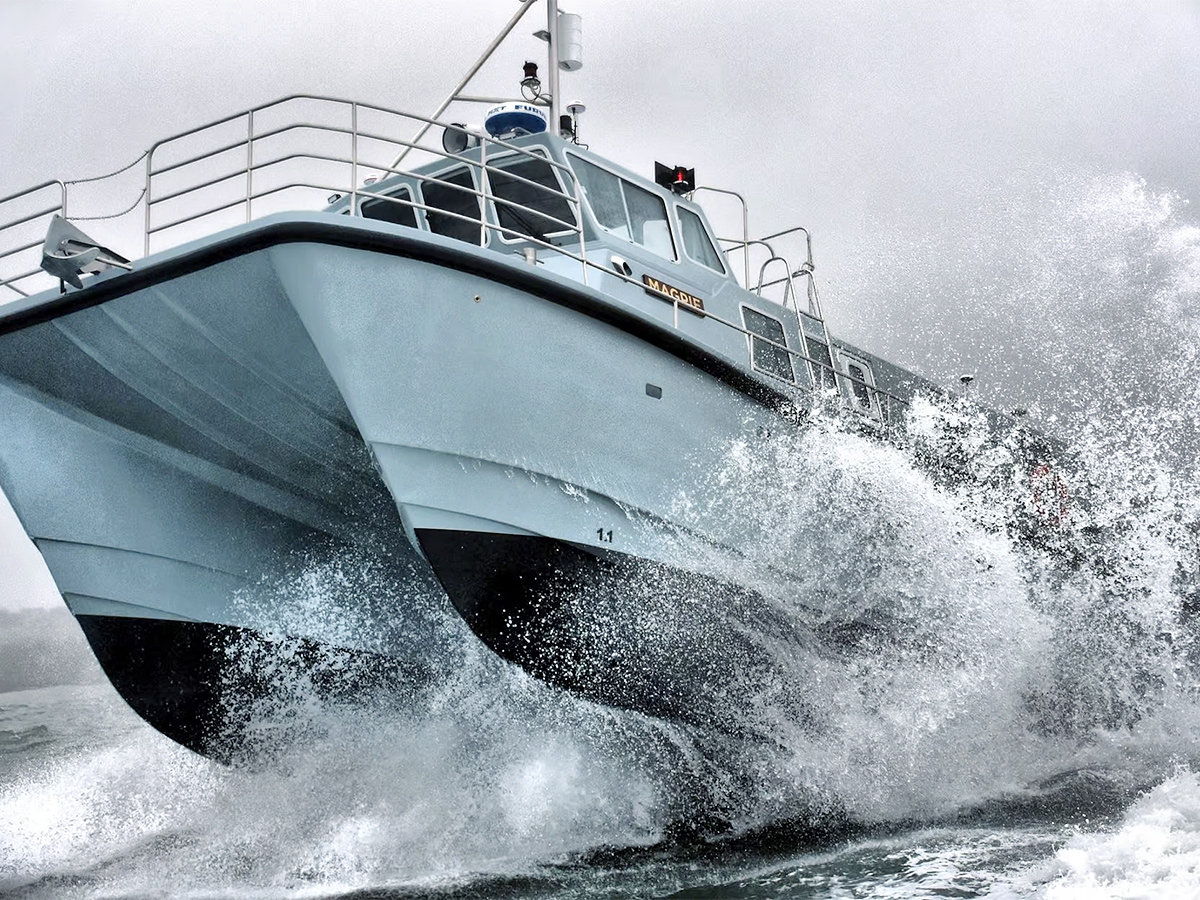 Twin hull hydrofoiling catamaran smashes big wave storm12