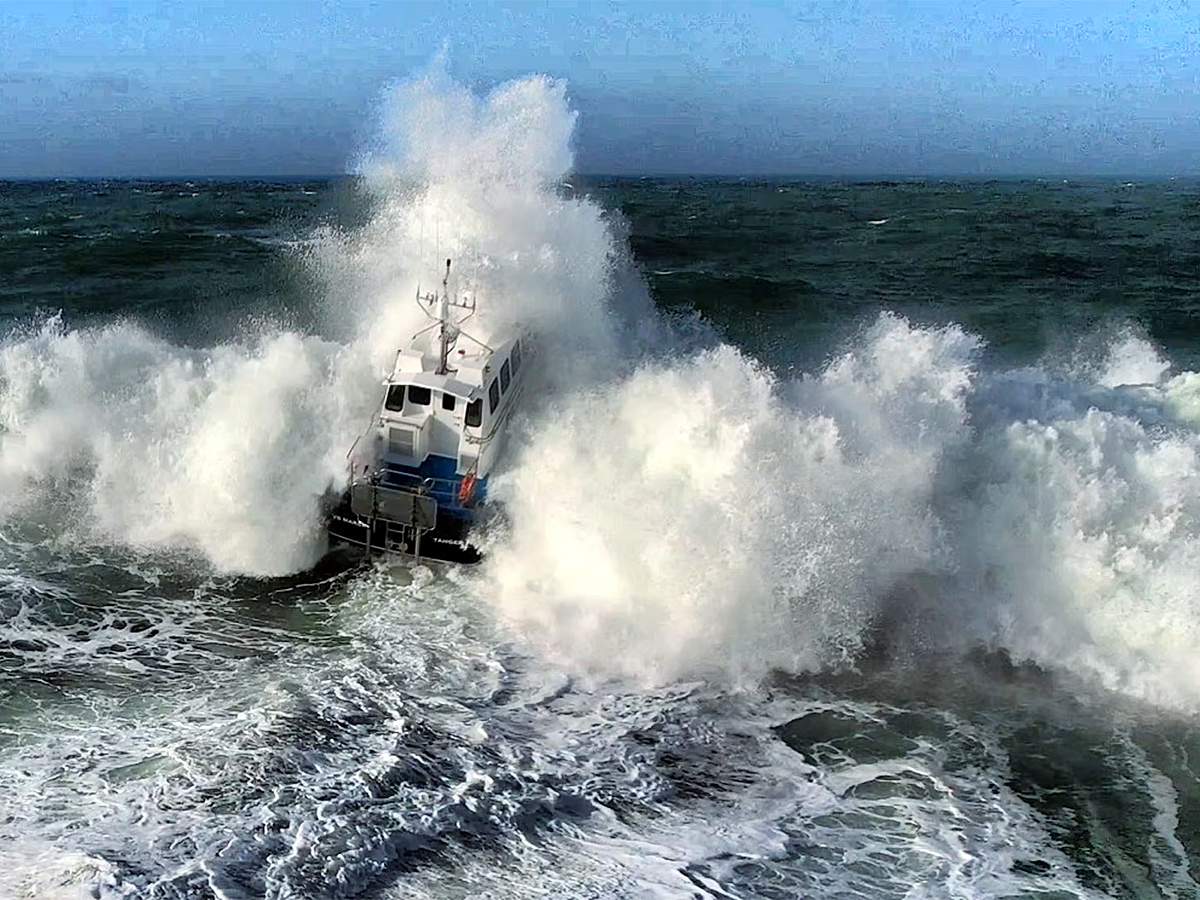 Twin hull hydrofoiling catamaran smashes big wave storm13