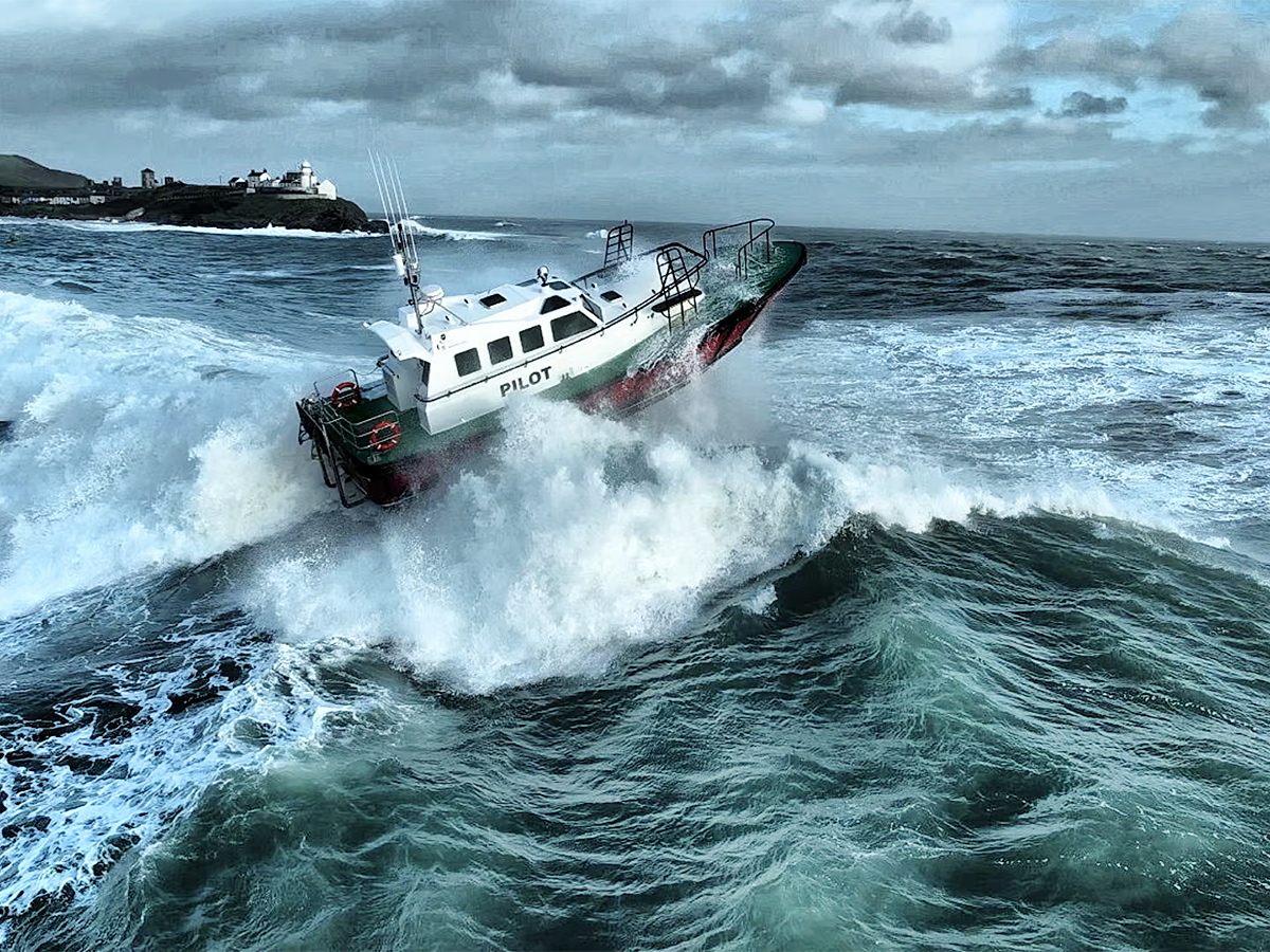 Twin hull hydrofoiling catamaran smashes big wave storm16