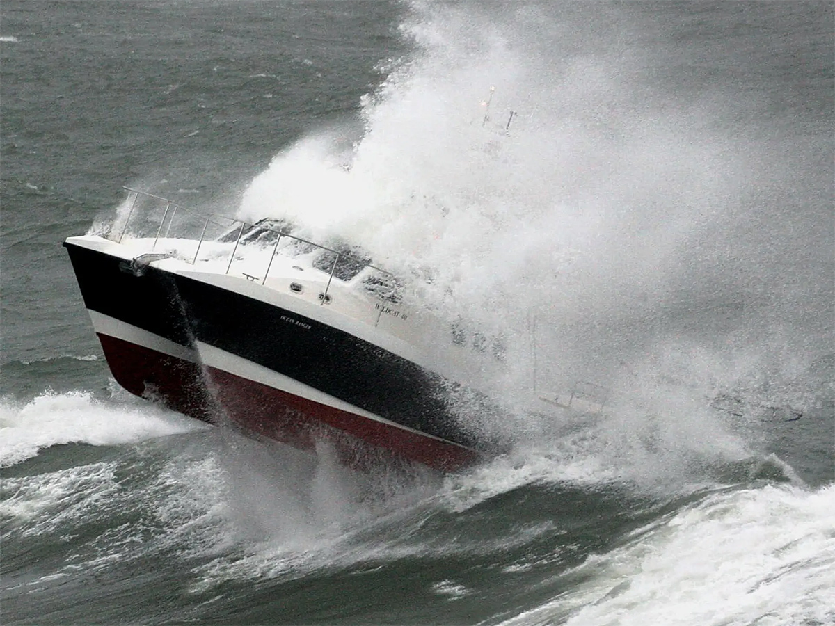 Twin hull hydrofoiling catamaran smashes big wave storm7